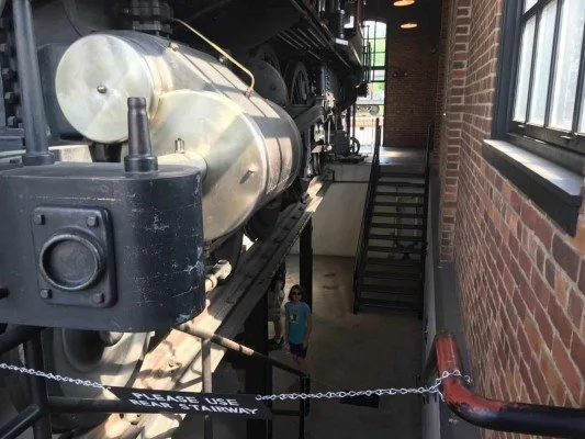 Greenfield Village Print Shop Apprentice Under the engine
