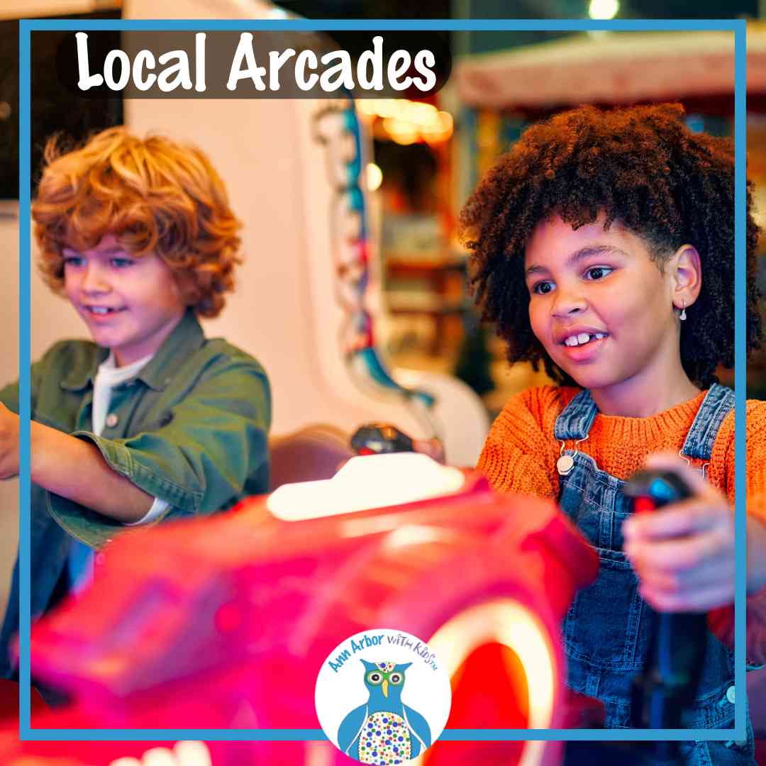 Local Arcades - two kids competing at a driving arcade game.