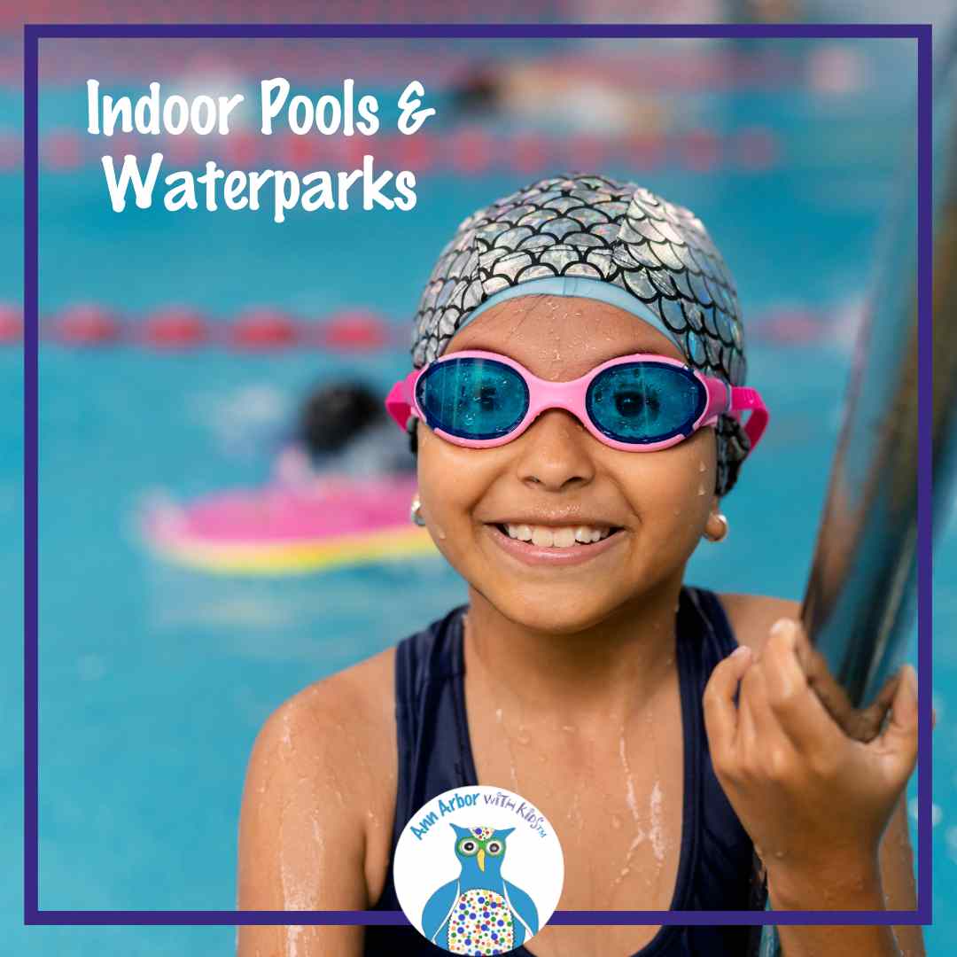Ann Arbor Indoor Pools & Waterparks - girl in goggles & swim cap climbs out of a pool with lane lines & a float behind her