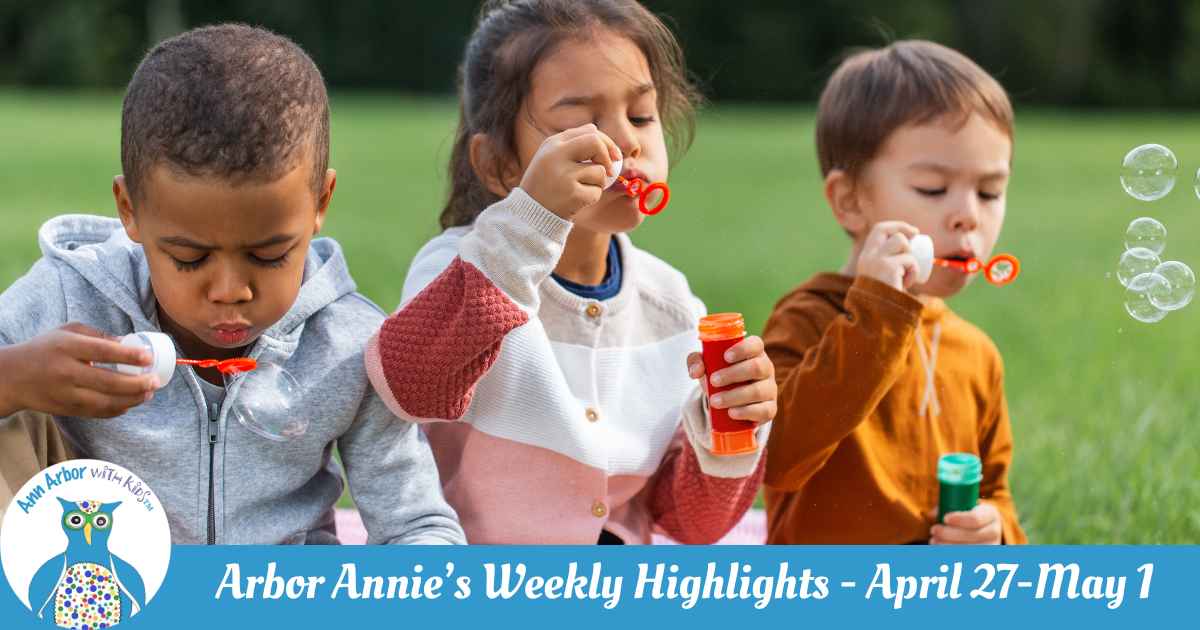 Arbor Annie's Weekly Highlights - April 27-May 1 - three kids sit on the grass blowing bubbles