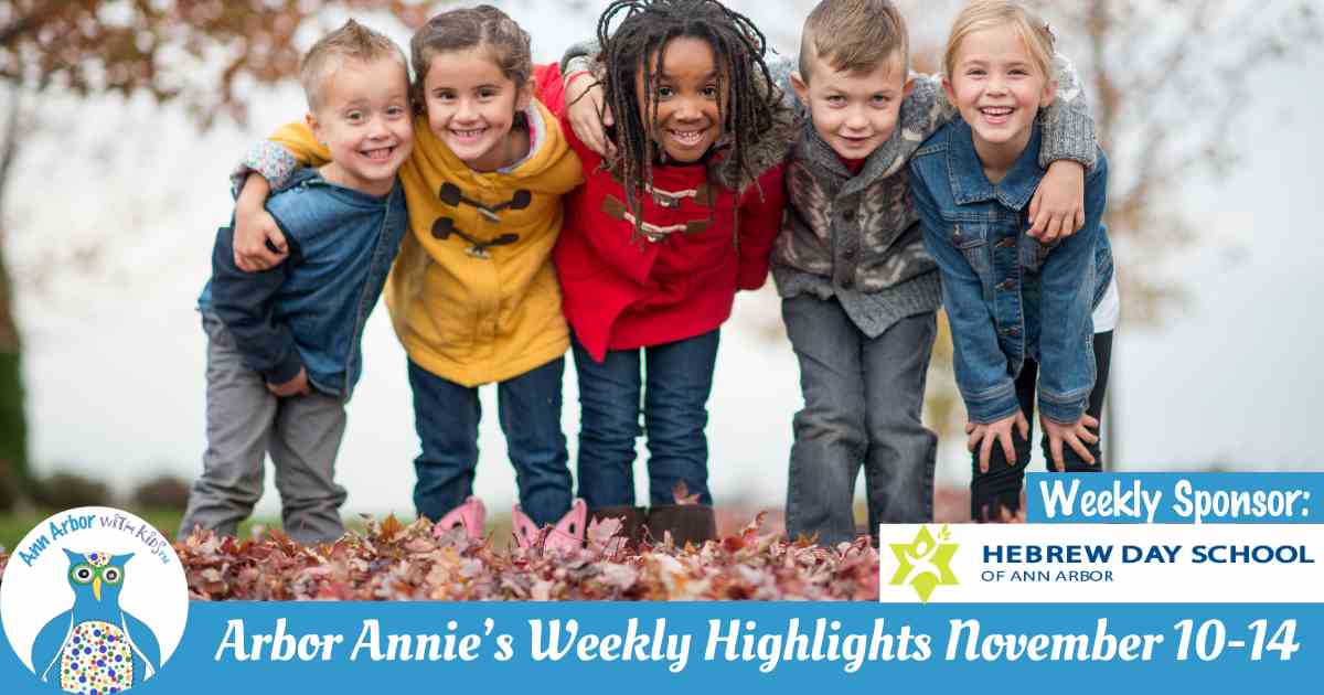 Arbor Annie's Weekly Highlights - November 10-14 - Group of kids dressed for fall huddled up while standing in leaves.