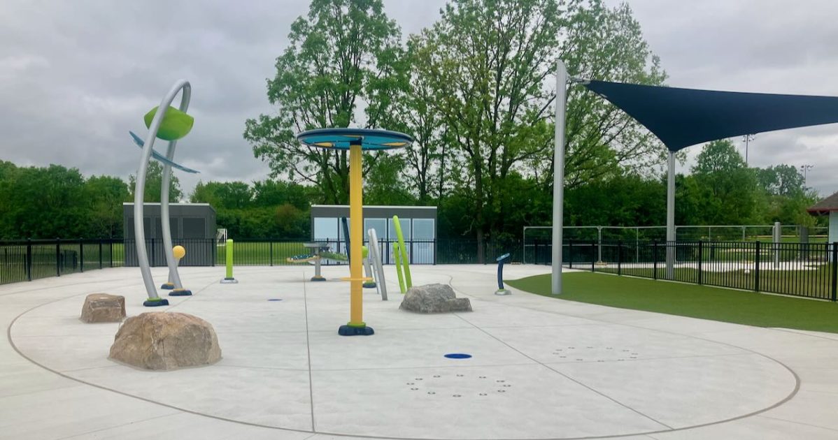 Bicentennial Park - New Splash Pad featuring a dumper, a shower, ground jets, and more water spray features. Plus a shade sail. The splash park has no water yet.
