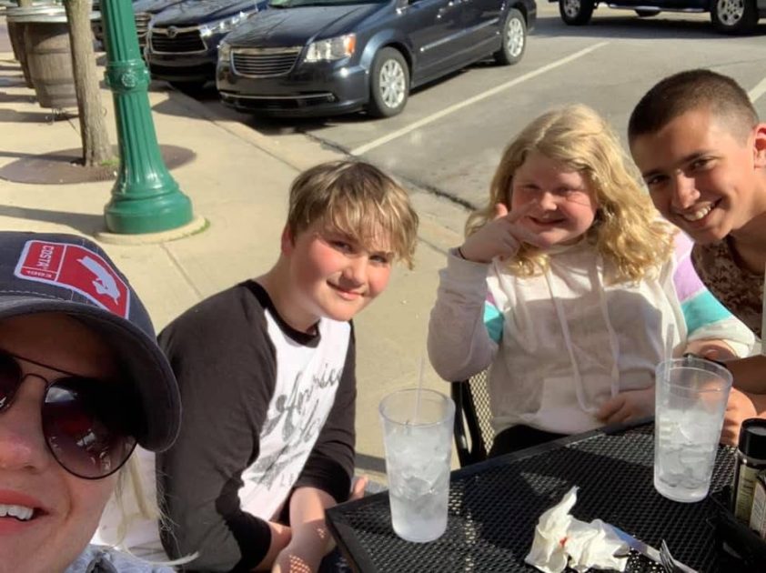 RunTough - family selfie at outdoor table