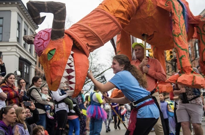 Fool Moon - Giant orange puppet interacts with crowd - photo provided by FestiFools Team