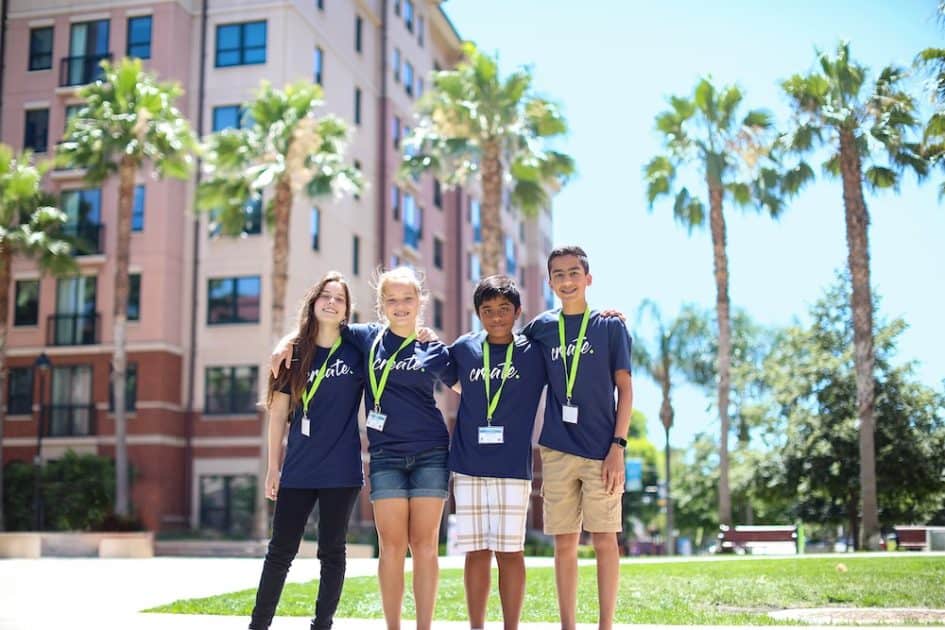 id Tech Camps - teen students outside a dorm building on a college campus