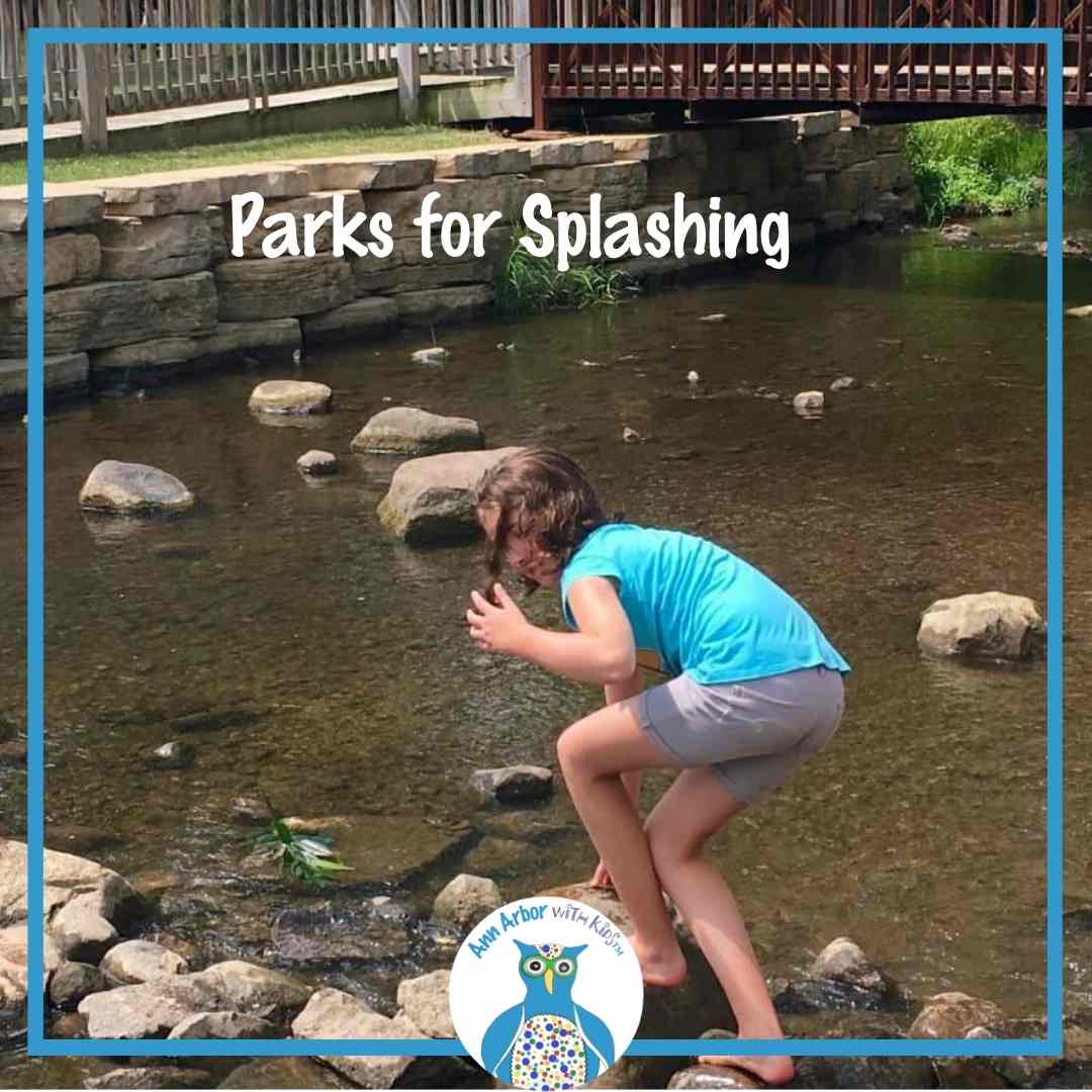Parks for Splashing - a tween climbs rocks in a creek (at Saline's Mill Pond Park)