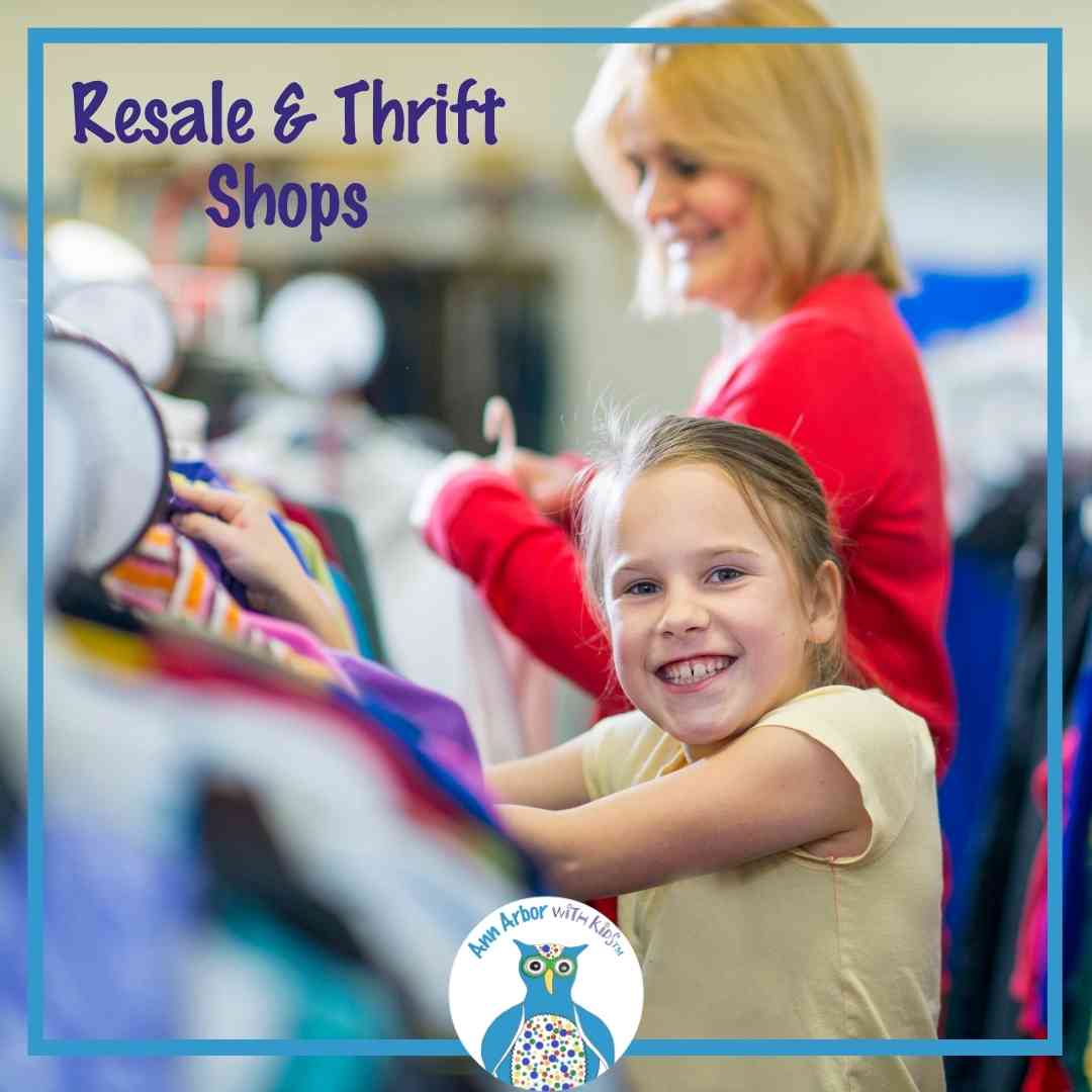 Thrift, Resale & Consignment Shops Near Ann Arbor - mom & daughter browse thrift shop clothing racks