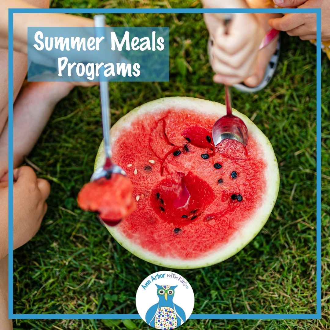 Free Summer Meals programs - 3 kids sit in a field eating large watermelon slices