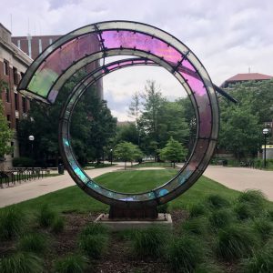 UMich - Arriving Home Sculpture -a loop of metal and colored glass